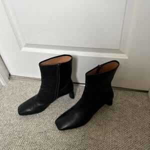 Chic Black Leather Heeled Boots